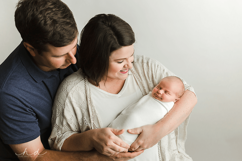 parent newborn pose hope davis photography