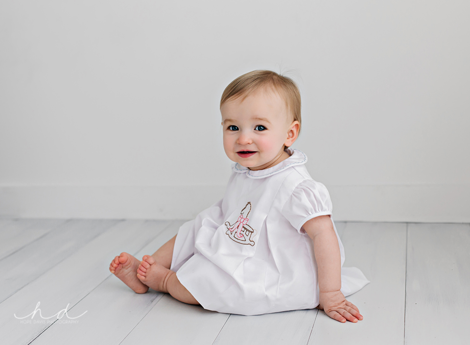 simple white one year old photo shoot