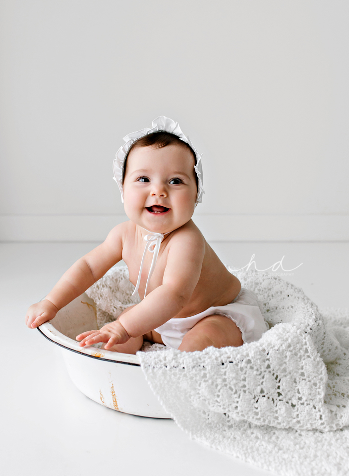 baby girl in a wash tub
