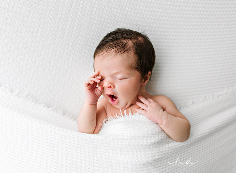 baby yawning newborn photographer