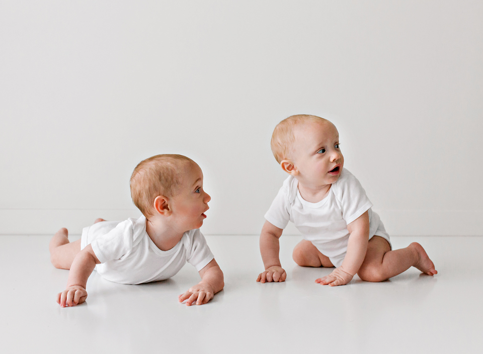 twins in white onesies baby photography