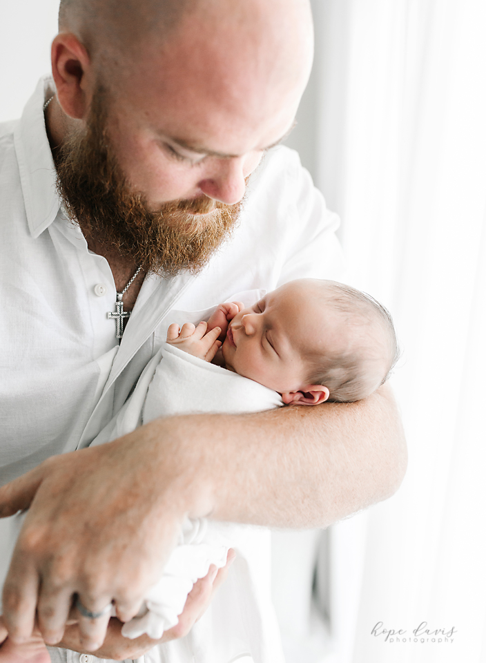 hope davis photography meridian ms father holding newborn son