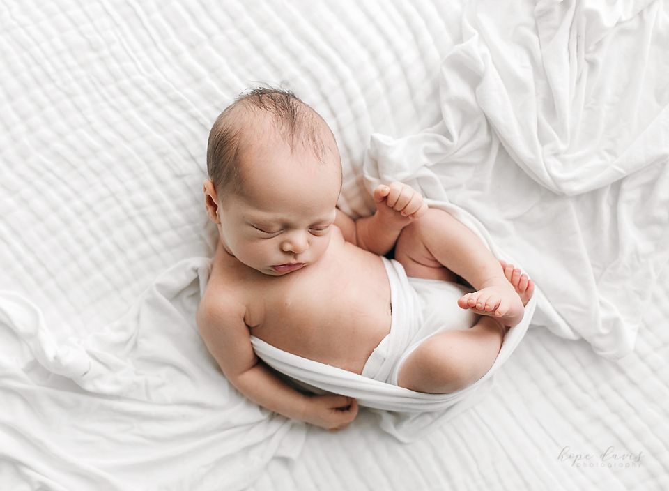 hope davis photography meridian ms newborn photographer baby on white blanket