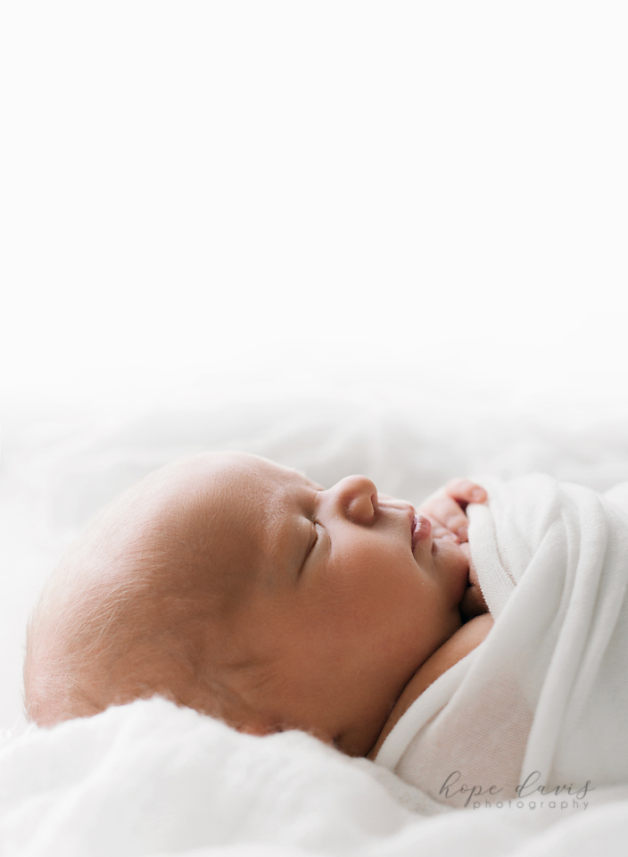 jackson mississippi newborn photographer baby girl on white