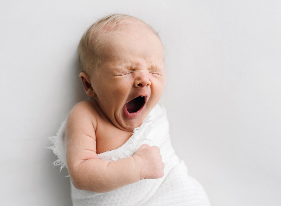 meridian ms modern baby photographer baby yawning