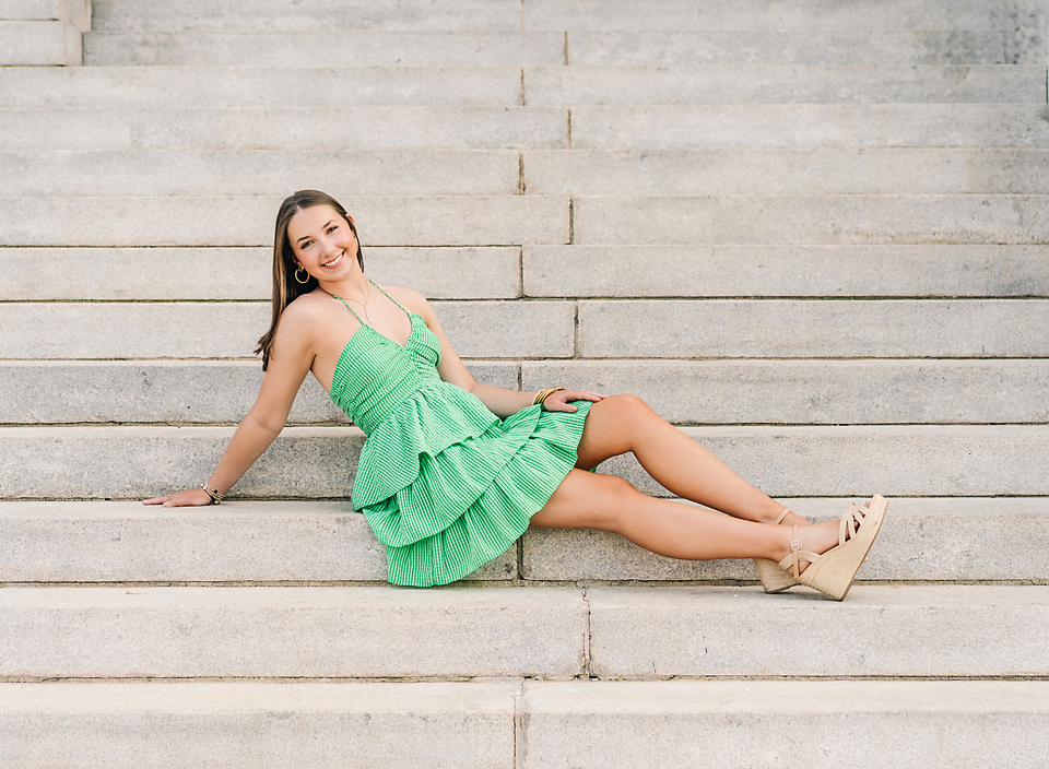 senior girl being photographed in meridian Mississippi on steps