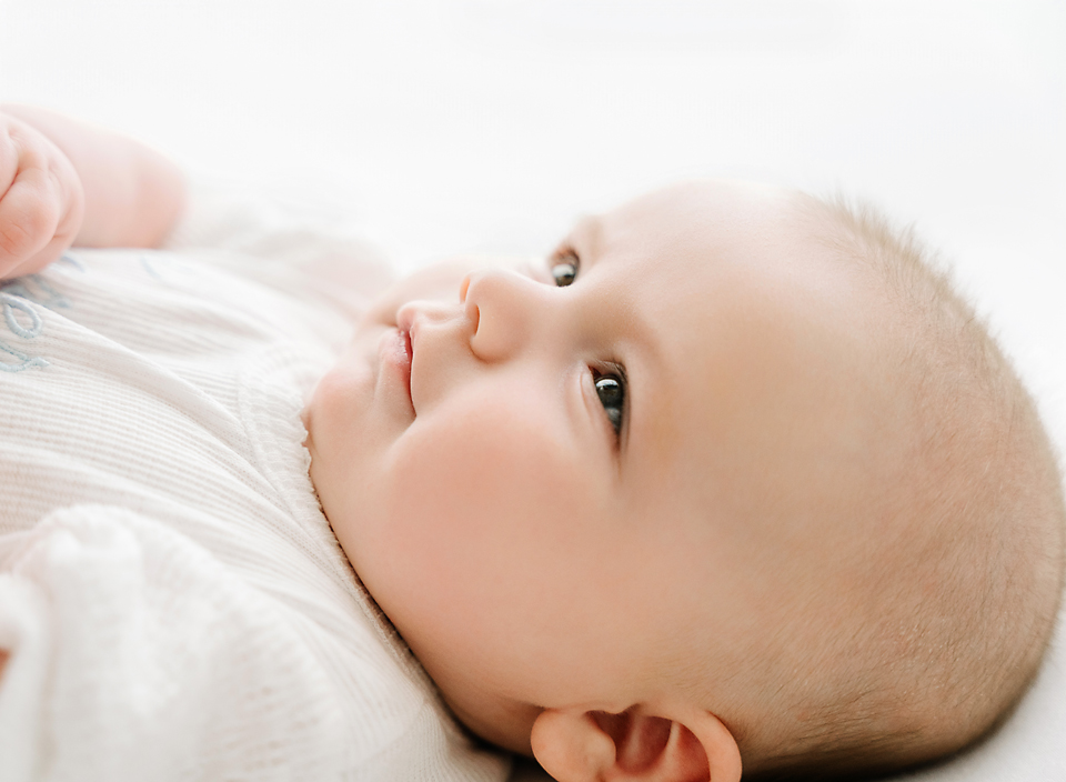 Side profile of 3 month old baby. Professional photography studio in Central Mississippi.
